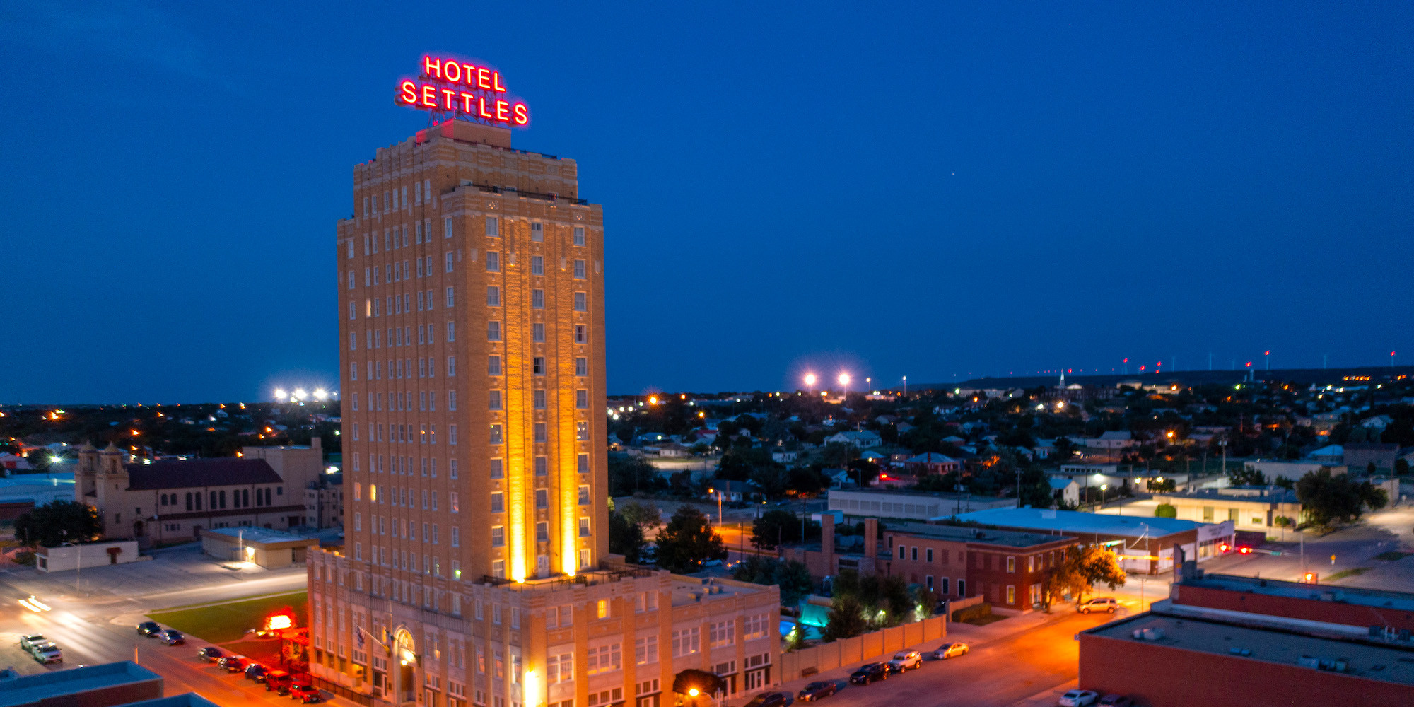 Hotel Settles building lit up at night